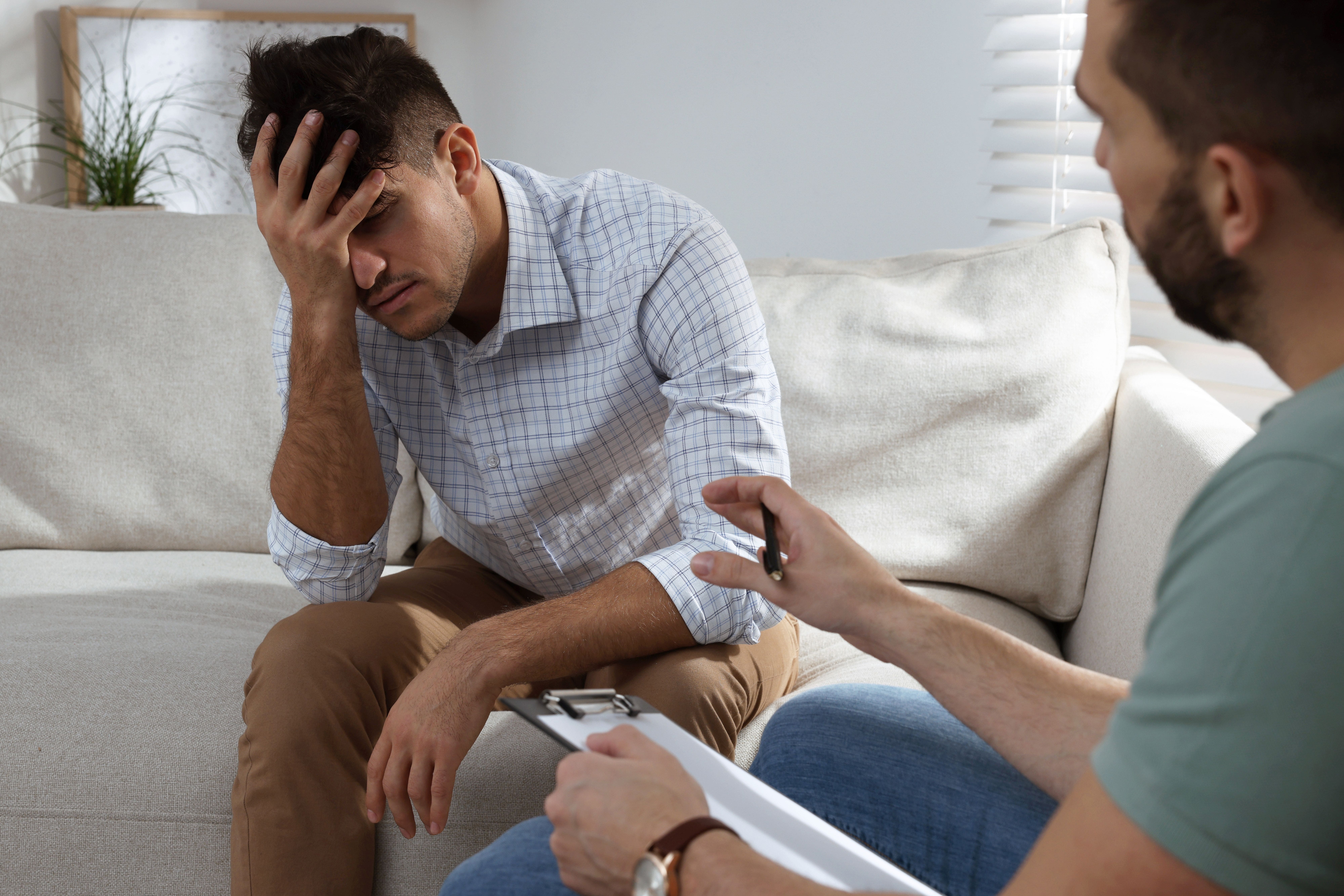 Man in therapy session discussing recovery options during fentanyl detox in Tennessee, receiving professional guidance for a safer and more effective detox process.